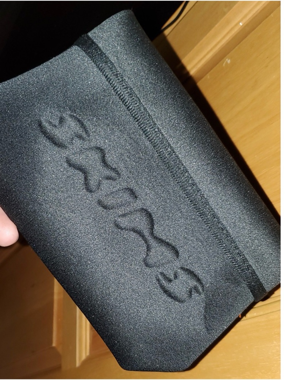 SKIMS Black Embossed Neoprene Clutch Wristlet